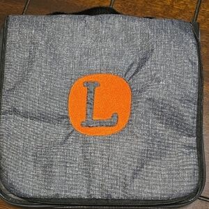 Thirty-One Gray Cosmetic Bag with Orange Accent